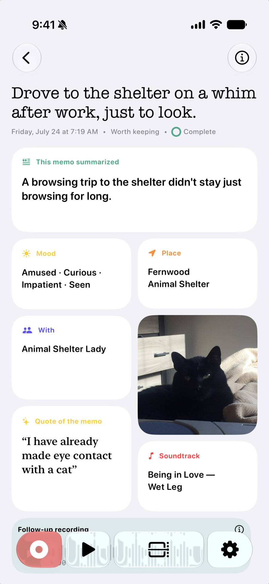 A Memo detail view with an AI summary, mood, place, companions, a quote, a soundtrack, and a photo of a black cat
